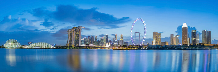 Wall Mural - singapore business district skyline at marina bay on twilight time.
