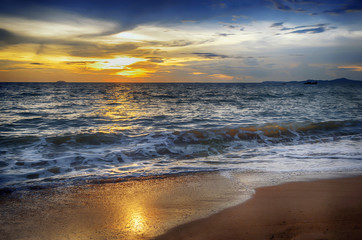 Wall Mural - beautiful beach sunrise on a summer morning at the shore