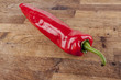 red peppers on a wooden background