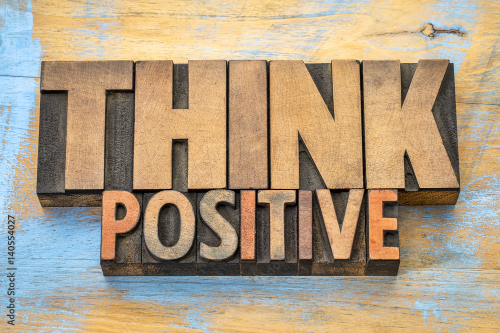 Think positive word abstract in wood type - obrazy, fototapety, plakaty 