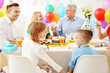 © Africa Studio - Family celebrating birthday at home