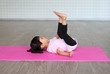 © zilvergolf - cute toddler girl practicing yoga