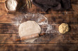 Roll out dough with rolling pin and flour