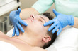 © lester120 - Man in the mask cosmetic procedure in spa salon