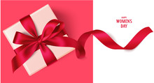 Decorative Gift Box With Red Bow And Long Ribbon. Happy Women's Day Text. Top View