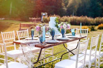 Wall Mural - Decorated beautiful table with candles