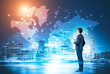 © ImageFlow - Man with coffee and network with world map