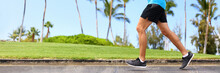 Fitness Man Athlete Runner Jogging On Park Sidewalk. Person Running Working Out Living An Active Lifestyle Training Cardio In Summer In Sportswear And Shoes. Lower Body Banner Crop.