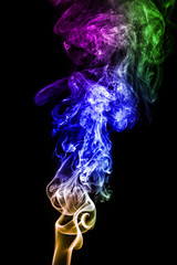 Wall Mural - colorful smoke on black background