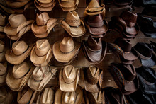 Rack Of Straw Cowboy Hats