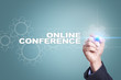 © WrightStudio - Businessman drawing on virtual screen. online conference concept.