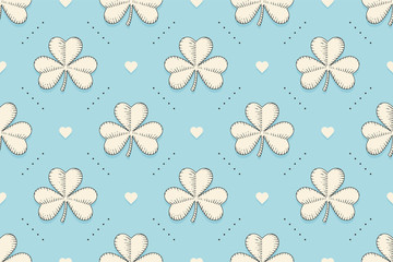  Seamless irish green pattern with clover and heart on blue background. Pattern for St. Patrick Day. Old school hand-drawn design in engraving style for wrapping paper, background. Vector Illustration