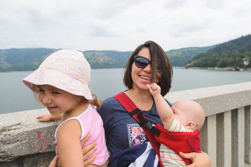 Canvas Print - Happy Woman with Children on Bridge