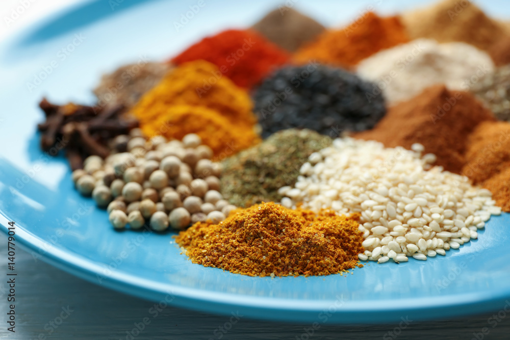 Plate with mix of different spices, closeup