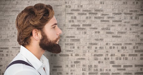 Sticker - Composite image of Man with beard against brick wall