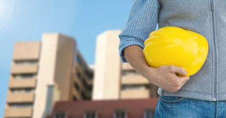 Canvas Print - Architect Torso holding a cask in the street