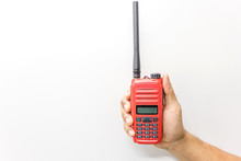 Red Walkie Talkie Handheld Isolated On A White Background With Copy Space And Text.