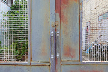 Wall Mural - old and rusty iron gate