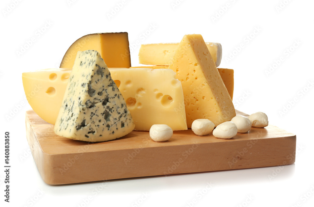 Assortment of cheese on wooden board isolated on white