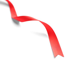 Silk red ribbon isolated on white