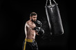 © LIGHTFIELD STUDIOS - Boxer with punching bag