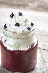 Wall Mural - Bilberry smoothie with whipped cream