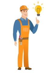 Wall Mural - Builder pointing at bright idea light bulb.