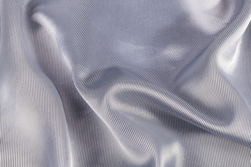 Silk background, texture of gray  shiny fabric