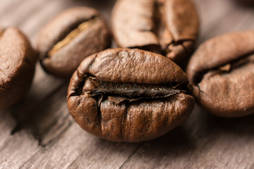 coffee beans on wooden board, closeup