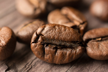 coffee beans on wooden board, closeup