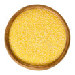 Cornmeal in wooden bowl. Raw uncooked meal, medium ground from dried maize. Common stable food. Boiled cornmeal is called polenta. Isolated macro food photo close up from above on white background.