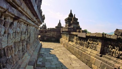 Wall Mural - Borobudur beautiful Buddhist stupa and temple complex. World's cultural heritage site and tourist landmark. Famous travel destination in Java Indonesia