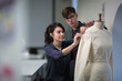© ReeldealHD images - Fashion students working on a design together