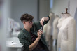© ReeldealHD images - Fashion student taking a photo of a design