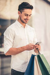 Wall Mural - Man doing shopping