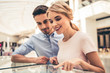 © georgerudy - Couple buying jewelry