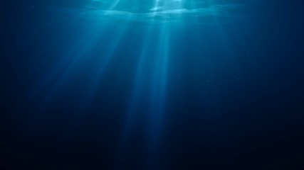sunlight rays shining through ocean surface. view from underwater. 3d rendered seamless loop animati