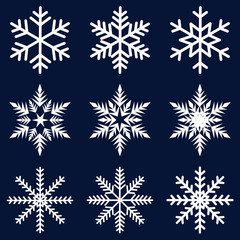 Wall Mural - nine white snowflakes set on a dark blue background icon winter crystal snow vector