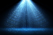 Stage light and blue glitter lights on floor. Abstract background for display your product. Spotlight realistic ray