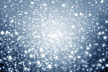 Snowflakes Particles And Bokeh Or Glitter Lights On Silver Background. Christmas Abstract Template