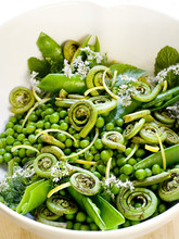 Side Dish Of Peas And Fronds