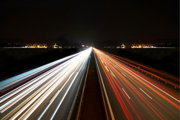 Wall Mural - light trails on highway symmetrical