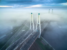 View Of The Bridge Over The River In The Fog. The Fog Enveloped The Bridge. Petersburg. Cable-stayed Bridge.