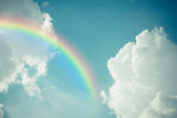 Fototapeta Tęcza - Blue sky cloud with rainbow , process in vintage style