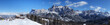 Corvara, Alta Badia winter panorama view with unrecognizable people near hut