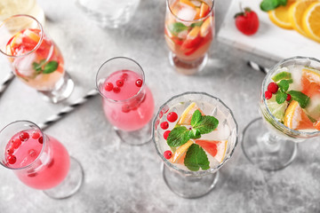 Sticker - Glasses of delicious wine spritzer on grey table