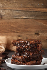 Wall Mural - Brownie. Homemade cake with chocolate and caramel. American dessert. Selective focus