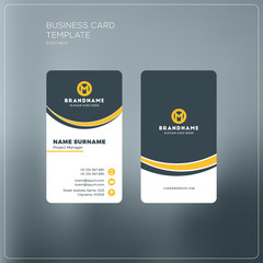 Wall Mural - Vertical business card print template. Personal business card with company logo. Black and yellow colors. Clean flat design. Vector illustration. Business card mockup