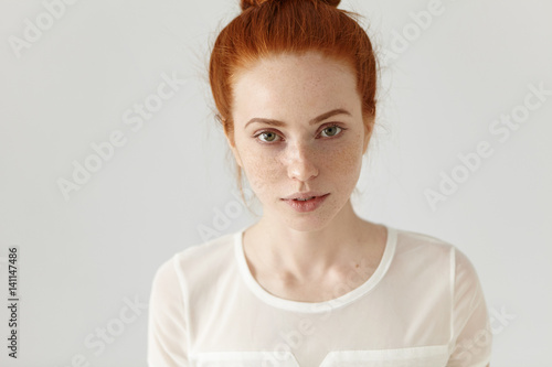 Top View Of Redhead Pretty Girl With Cute Subtle Smile And