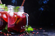 Tea with hibiscus, fruit, mint and ice, selective focus
